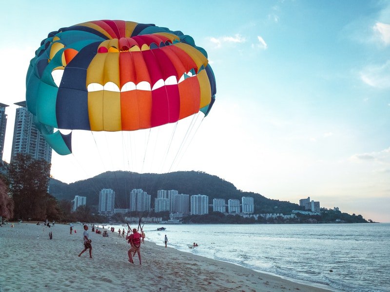 skydiver landing on beach