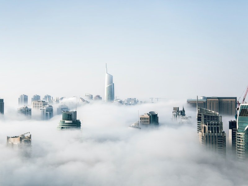 tall buildings and clouds
